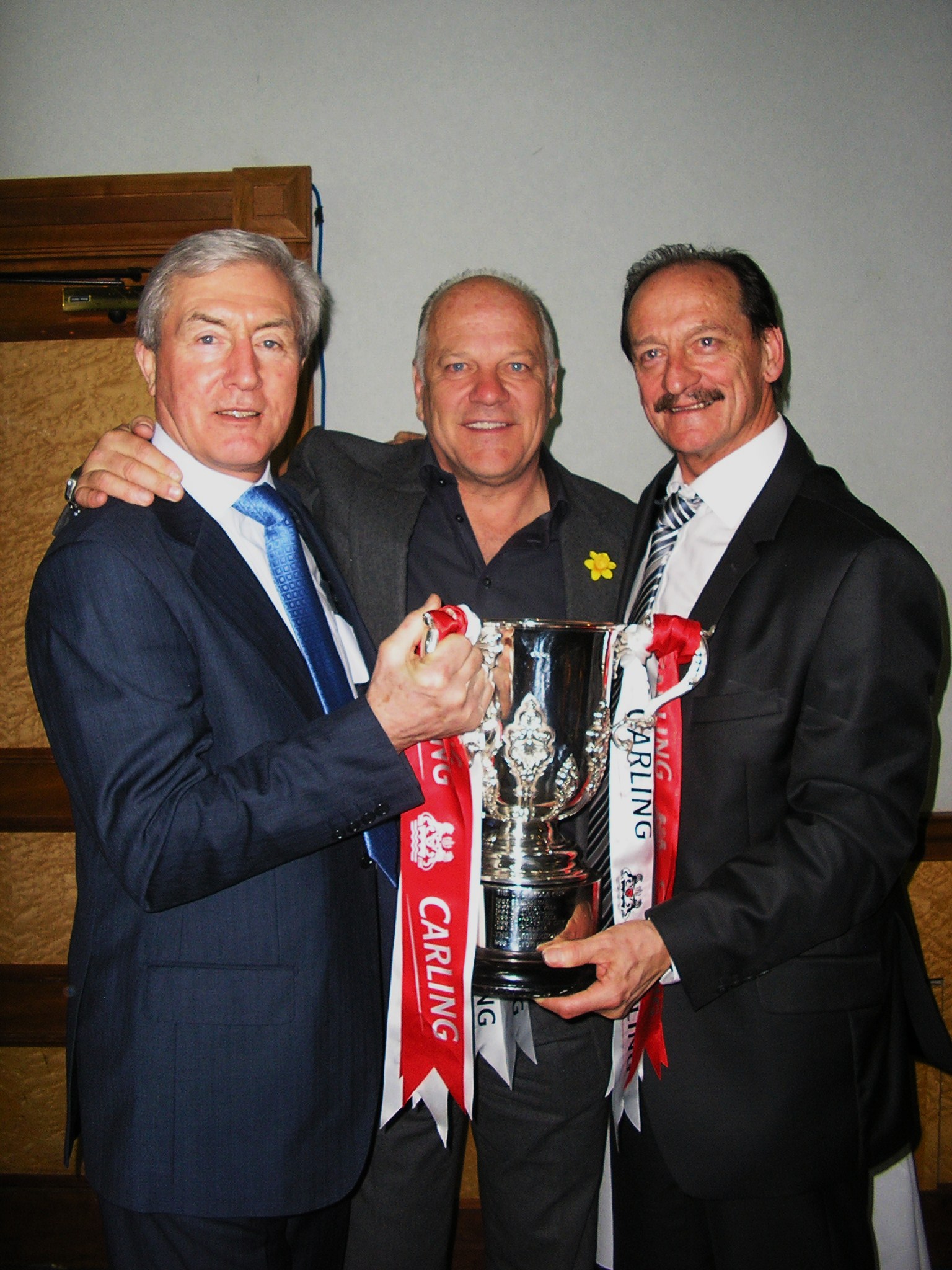 15. A rare photo of John Richards, Andy Gray and Kenny Hibbitt holding the League Cup